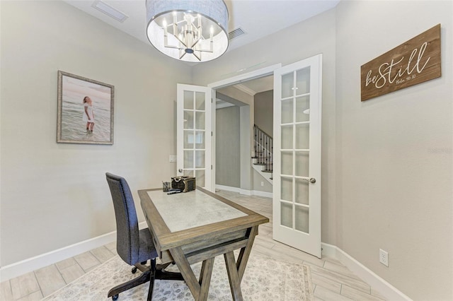 office featuring a chandelier, french doors, and wood-type flooring