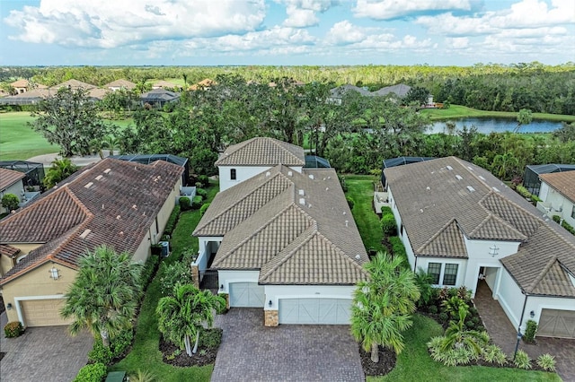 birds eye view of property featuring a water view