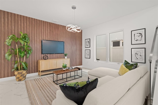 living room featuring a chandelier