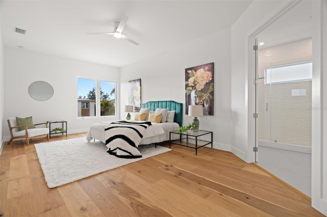 bedroom featuring hardwood / wood-style floors and ceiling fan