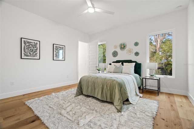 bedroom featuring ceiling fan and light wood-type flooring