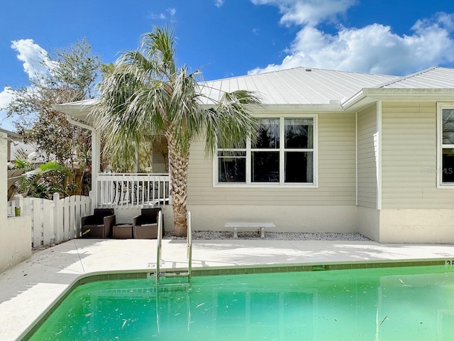 back of property with a patio area