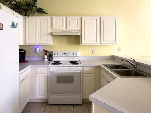 kitchen with white cabinetry, sink, light tile patterned flooring, and white appliances