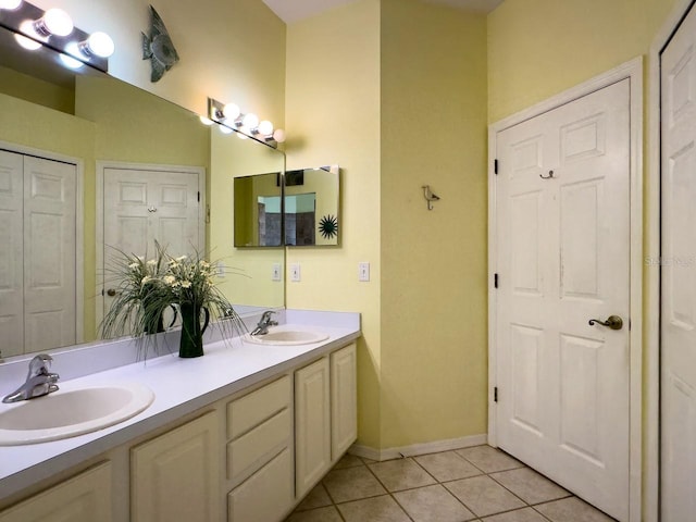 bathroom with vanity and tile patterned floors