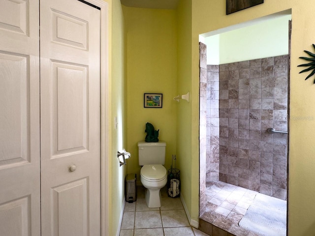 bathroom with tile patterned floors and toilet