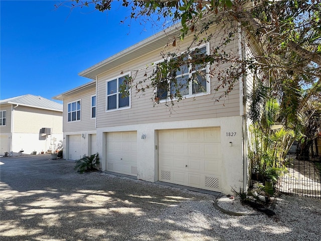 exterior space with a garage