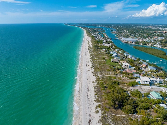 aerial view featuring a water view and a beach view