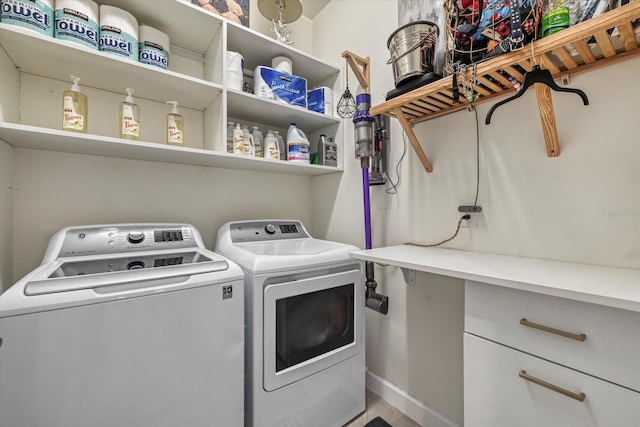 laundry room with washer and dryer