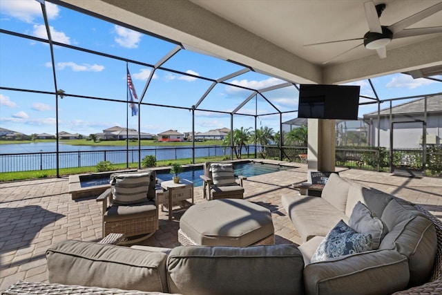 view of patio with outdoor lounge area, ceiling fan, and a lanai