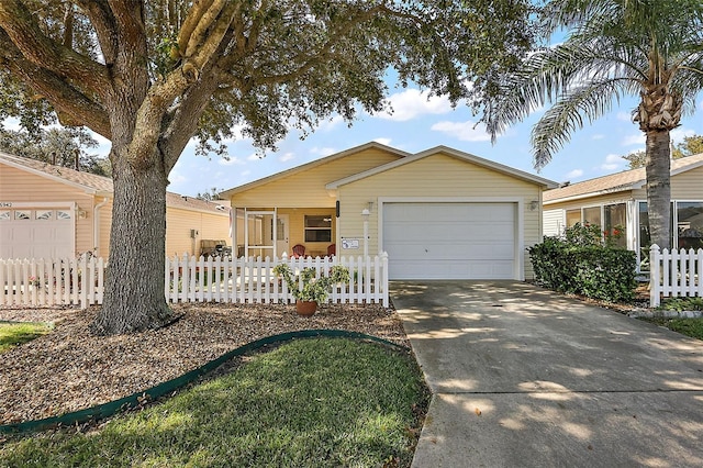 single story home with a porch and a garage