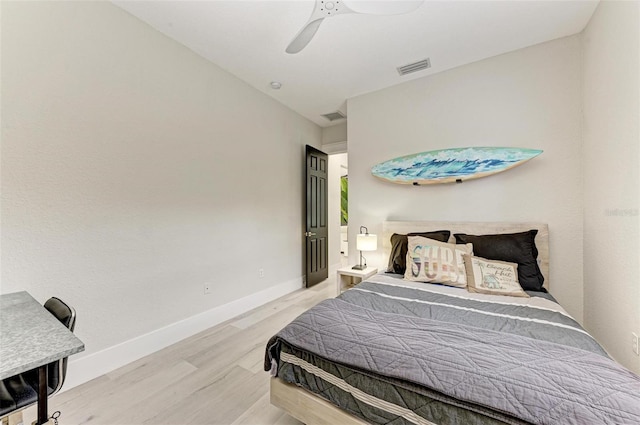 bedroom featuring light hardwood / wood-style flooring and ceiling fan