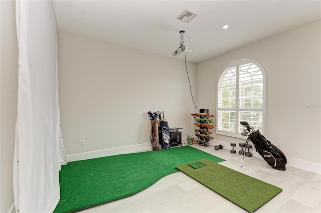 playroom with golf simulator