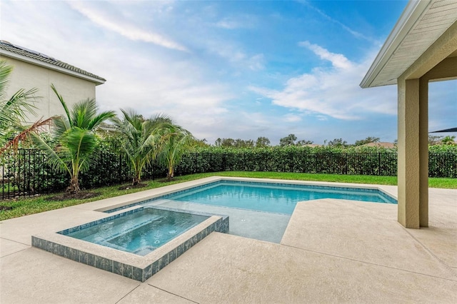 view of pool featuring an in ground hot tub and a patio area