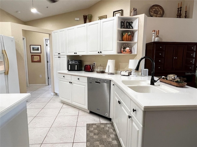 kitchen featuring white cabinets, dishwasher, white fridge, and sink