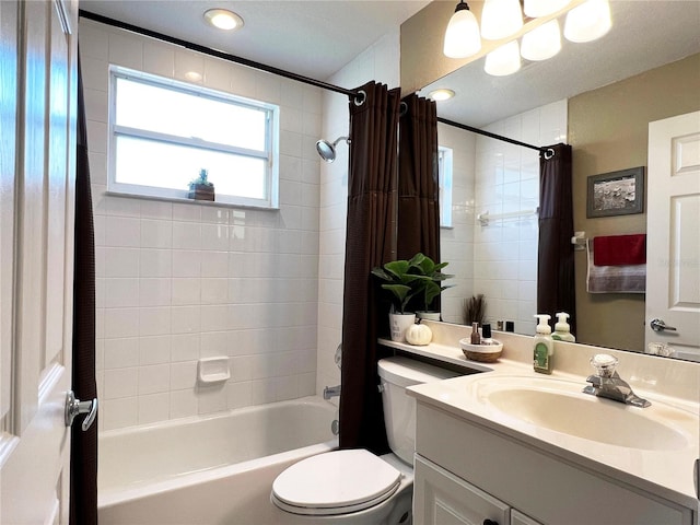 full bathroom with shower / tub combo, vanity, and toilet