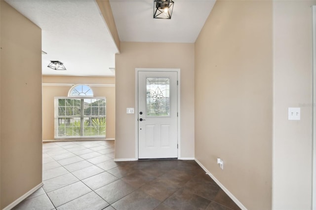 entrance foyer with tile patterned floors