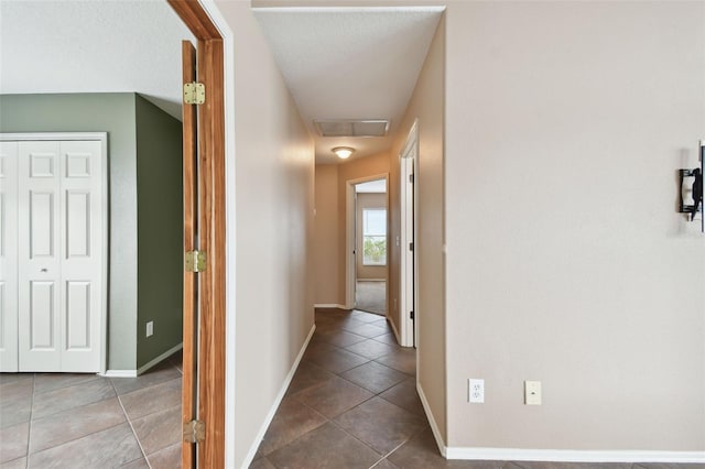 hall featuring tile patterned floors