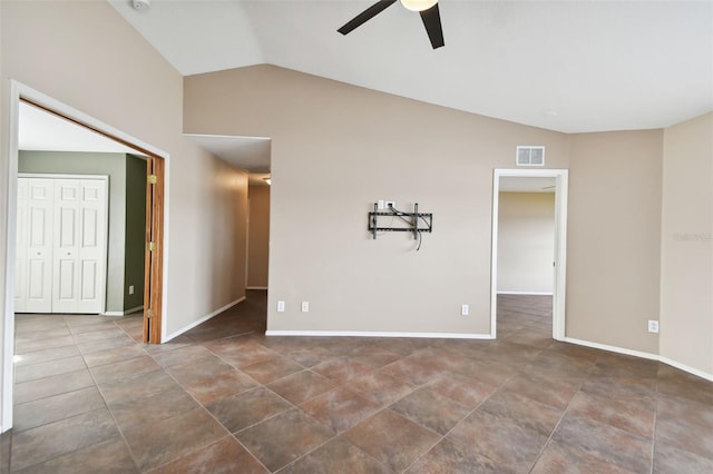 unfurnished room with vaulted ceiling and ceiling fan