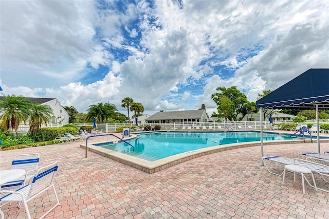 view of swimming pool featuring a patio