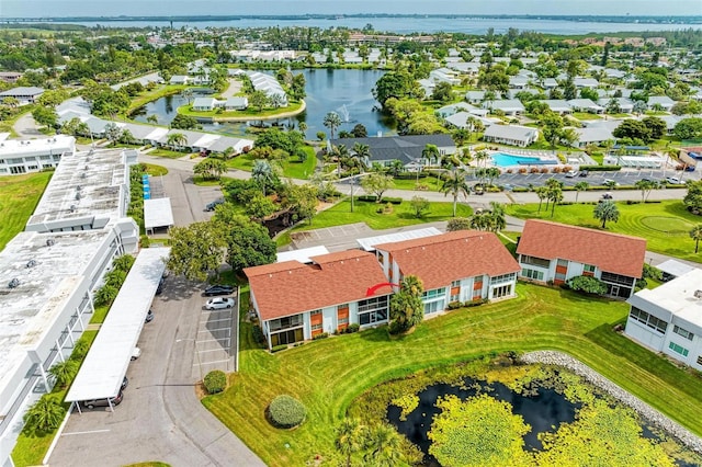 bird's eye view with a water view