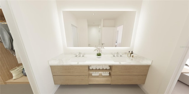 bathroom featuring tile patterned flooring and vanity