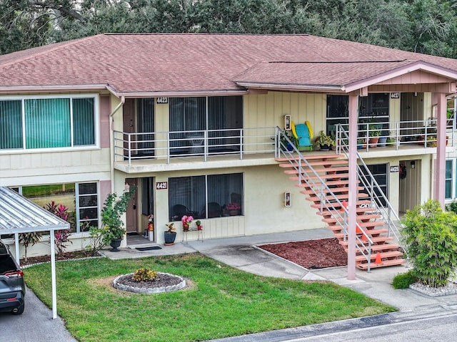 exterior space featuring a carport