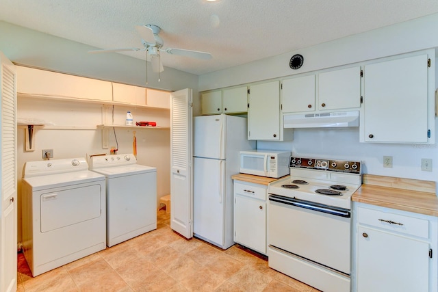 kitchen with separate washer and dryer, a textured ceiling, white appliances, and ceiling fan