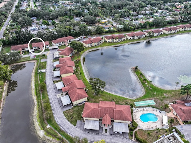 birds eye view of property featuring a water view