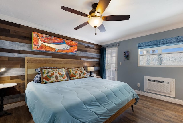 bedroom with ceiling fan, wood walls, dark wood-type flooring, and a wall mounted AC