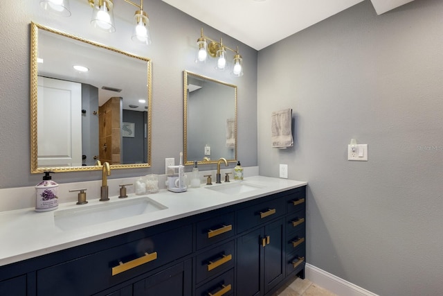 bathroom with vanity and tile patterned floors