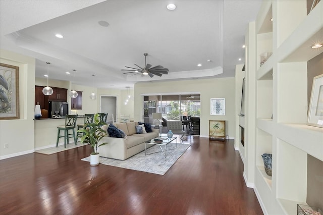 575 Fore Dr, Bradenton, FL 34208 - living room with a raised ceiling, wood finished floors, a ceiling fan, baseboards, and recessed lighting