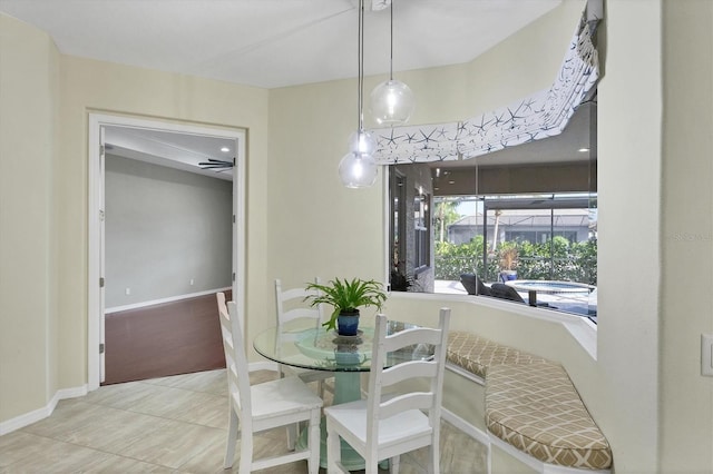 view of tiled dining space