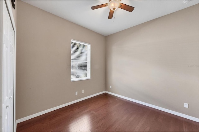 575 Fore Dr, Bradenton, FL 34208 - spare room with a ceiling fan, dark wood-style flooring, and baseboards