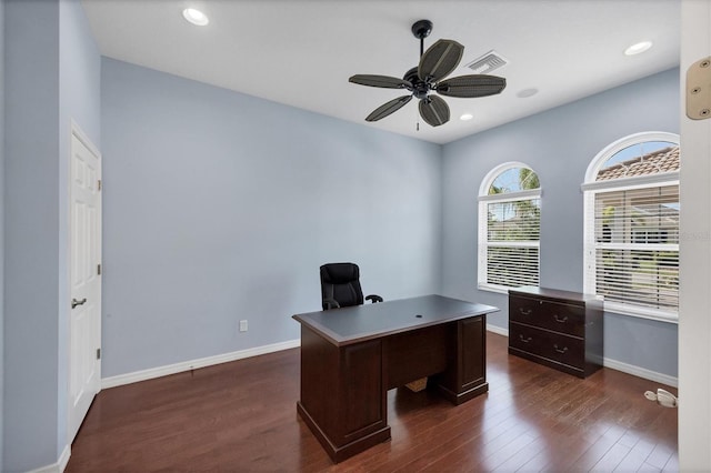 office space with ceiling fan and dark hardwood / wood-style flooring