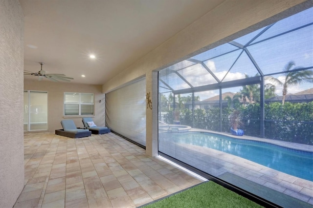 575 Fore Dr, Bradenton, FL 34208 - view of swimming pool featuring ceiling fan and a pool with connected hot tub