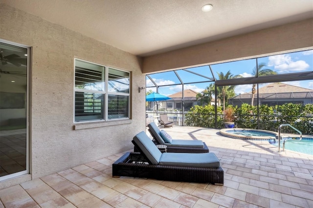 575 Fore Dr, Bradenton, FL 34208 - view of patio / terrace with a hot tub, glass enclosure, and an outdoor pool