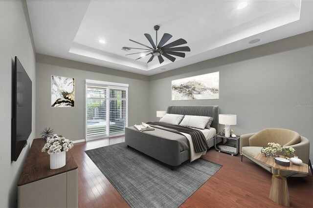 575 Fore Dr, Bradenton, FL 34208 - bedroom with a raised ceiling, access to exterior, wood finished floors, recessed lighting, and a ceiling fan