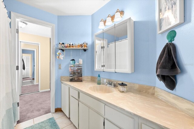 bathroom with vanity and tile patterned floors