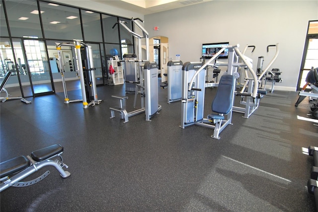 gym with a wealth of natural light