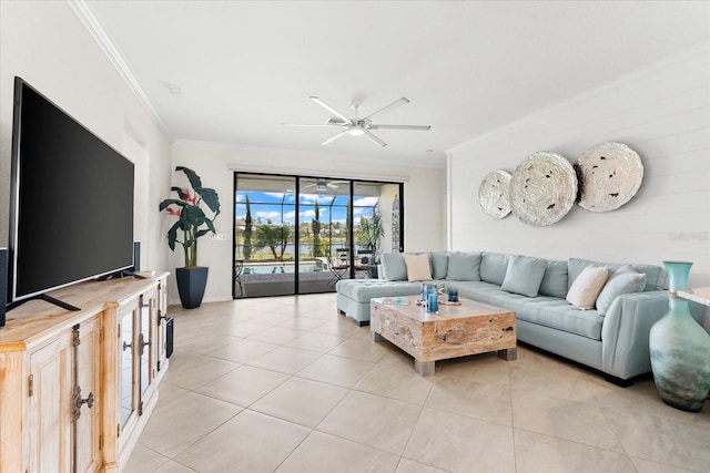 living room featuring crown molding, light tile patterned floors, and ceiling fan