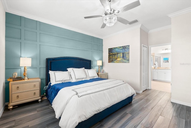 bedroom with ensuite bathroom, ceiling fan, ornamental molding, and dark wood-type flooring