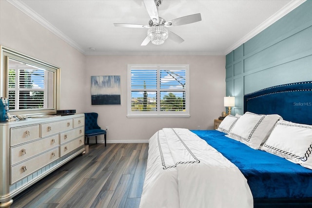 bedroom featuring ceiling fan, dark hardwood / wood-style floors, and ornamental molding