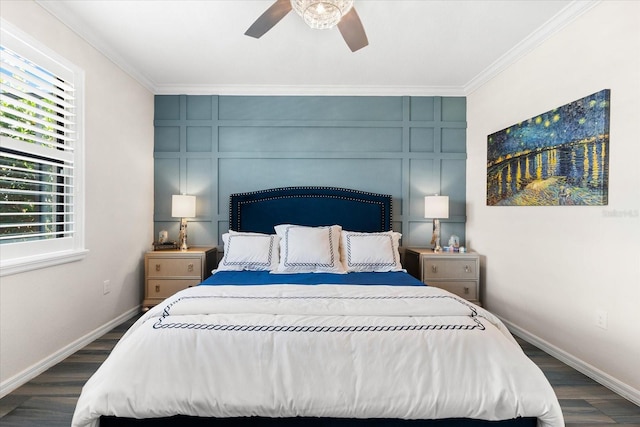 bedroom featuring ceiling fan, dark wood-type flooring, and multiple windows