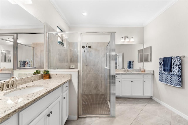 bathroom featuring tile patterned flooring, vanity, a shower with shower door, and ornamental molding