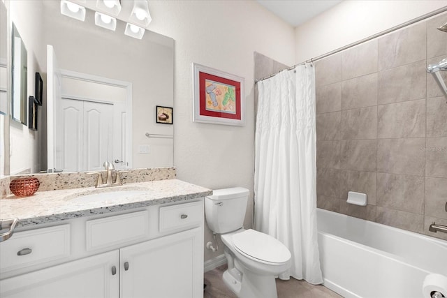 full bathroom featuring vanity, toilet, and shower / tub combo