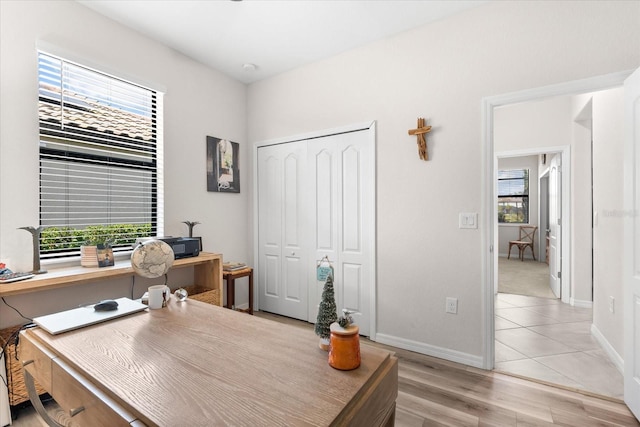 office with light hardwood / wood-style floors