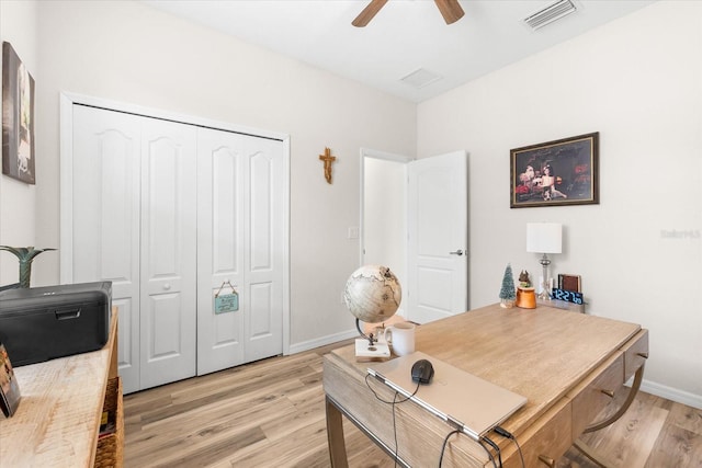 home office featuring ceiling fan and light wood-type flooring