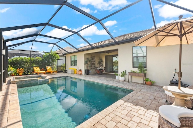 view of swimming pool featuring ceiling fan, a lanai, a patio, and an in ground hot tub