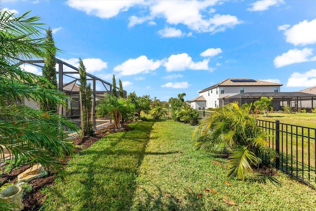 view of yard with a lanai