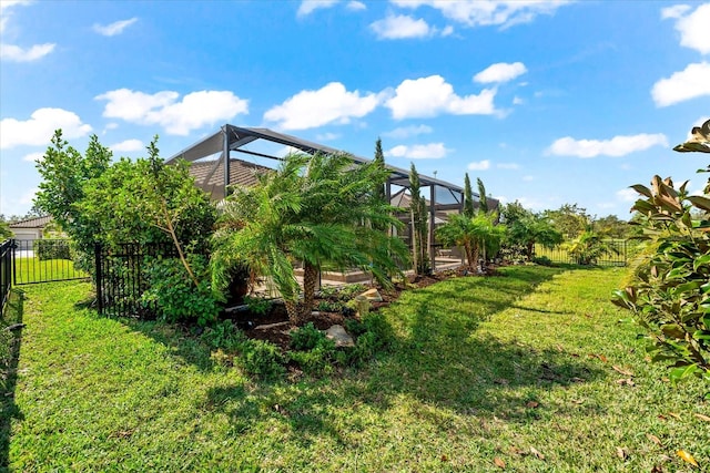 view of yard with a lanai